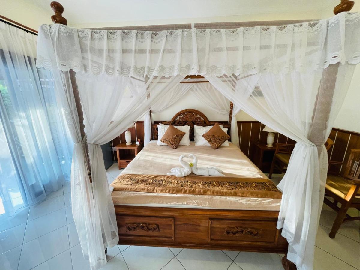 Mutiara Bali Hotel จันดีดาซา ภายนอก รูปภาพ