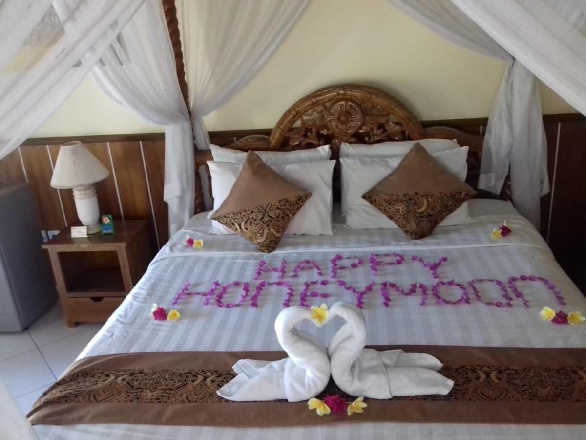 Mutiara Bali Hotel จันดีดาซา ภายนอก รูปภาพ