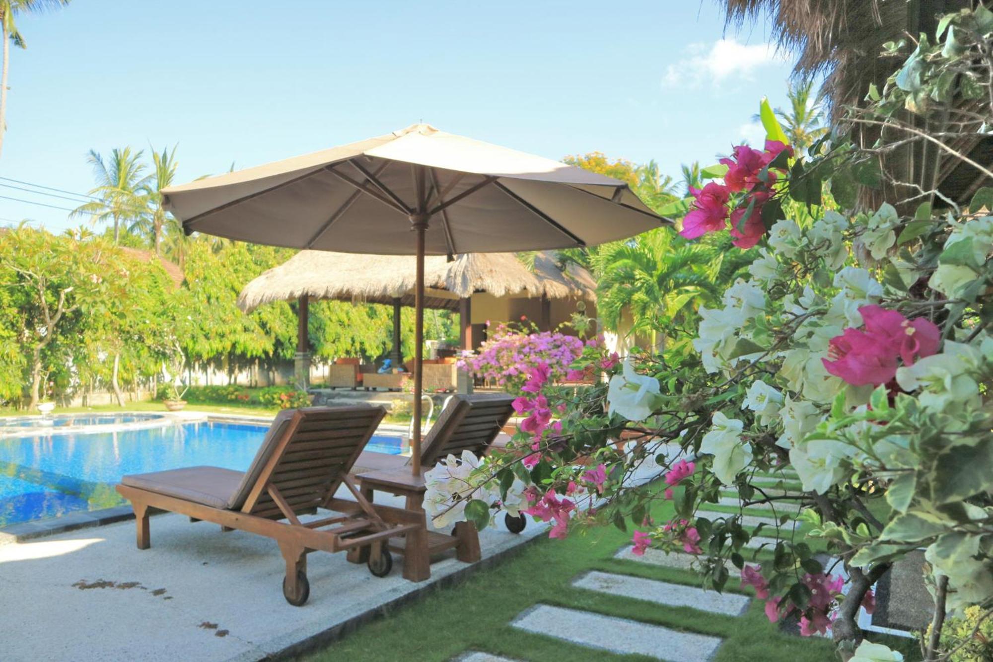 Mutiara Bali Hotel จันดีดาซา ภายนอก รูปภาพ