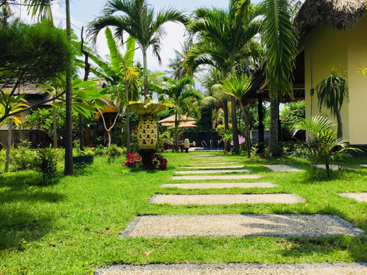 Mutiara Bali Hotel จันดีดาซา ภายนอก รูปภาพ